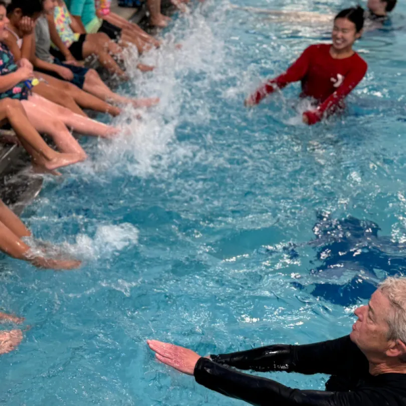 Swim instructors teach Safety Around Water skills.
