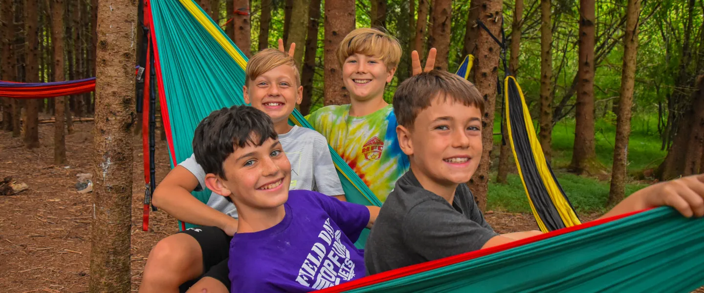 A group of boys in hammocks at YMCA Camp Watia.