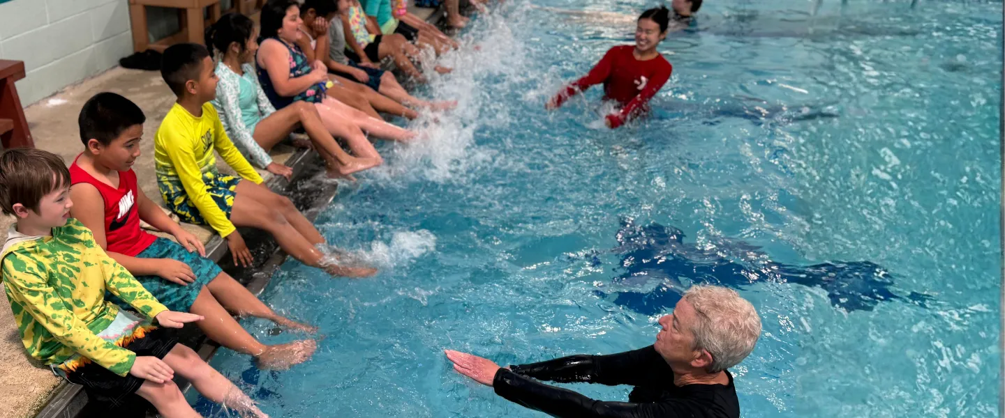 Swim instructors teach Safety Around Water skills.